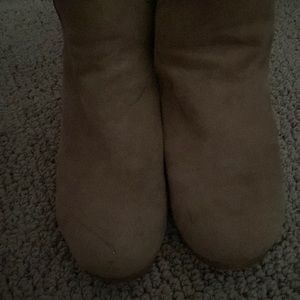 Light brown high heeled boots,